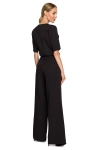elegancki kombinezon damski do codziennych stylizacji z szeroką nogawką typu wide leg i prostym krótkim rękawem.webp