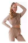 beżowa bluzka damska z elastycznym dołem.webp