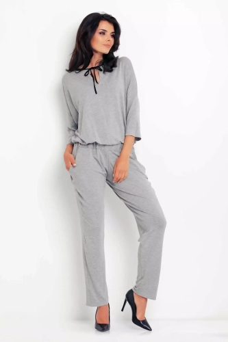 szary kombinezon damski z dekoltem na plecach.webp