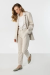 lniane spodnie jasny beż eleganckie do biura.webp