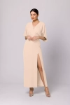 Kremowa sukienka maxi z rozcięciem.webp