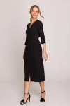 kobieca sukienka elegancka o kopertowym kroju.webp