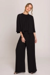 stylowy kombinezon damski z luźną górą.webp