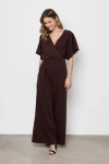Wizytowy brązowy kombinezon z wiązaniem w talii i gumką z tyłu.webp
