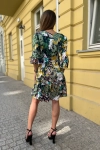 Elegancka sukienka mini z ozdobnym dołem.webp
