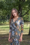 Rozkloszowana sukienka damska midi kwiaty.webp